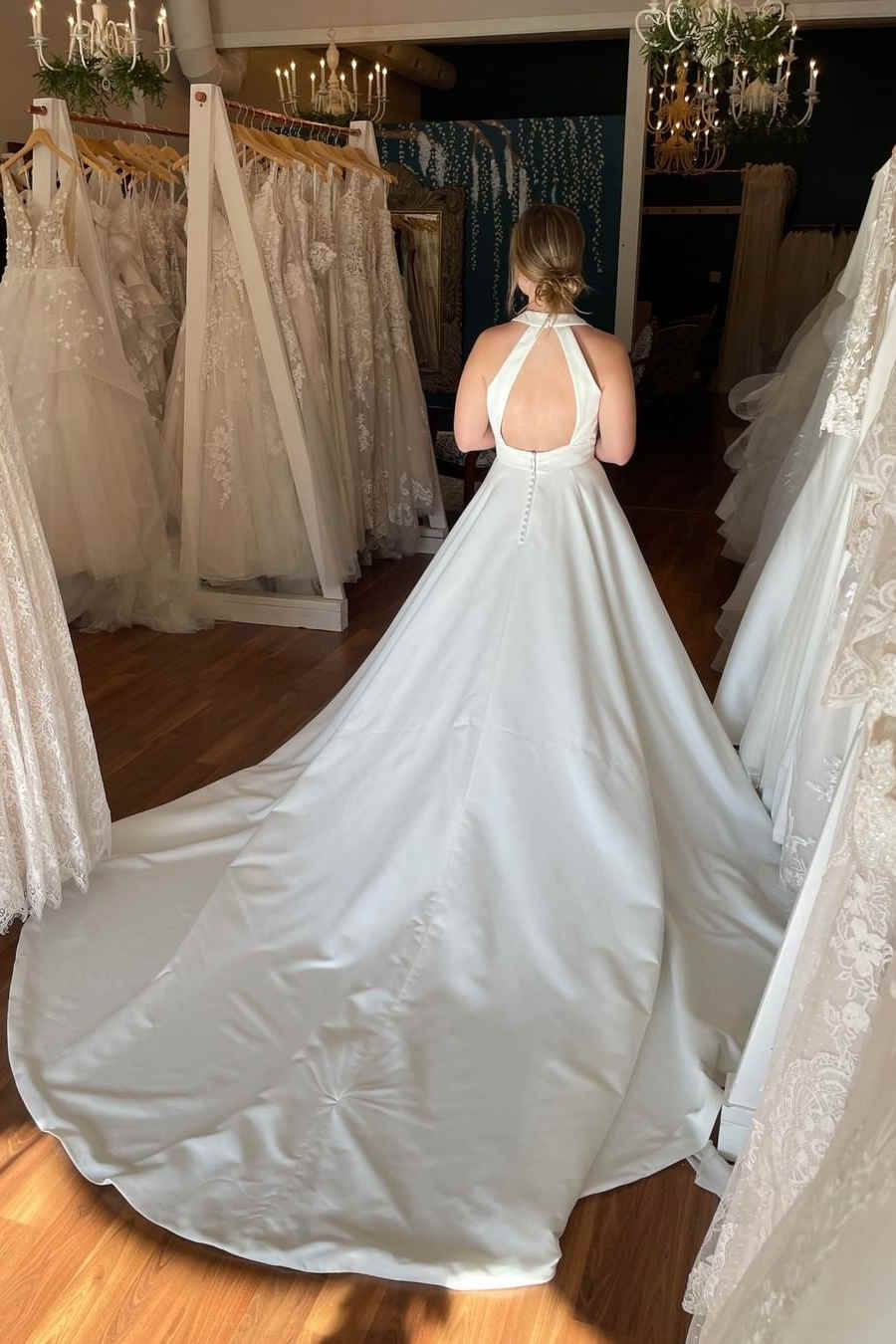 Elegant Ivory Plunging Halter Mermaid Style Bridal Dress with Functional Pockets