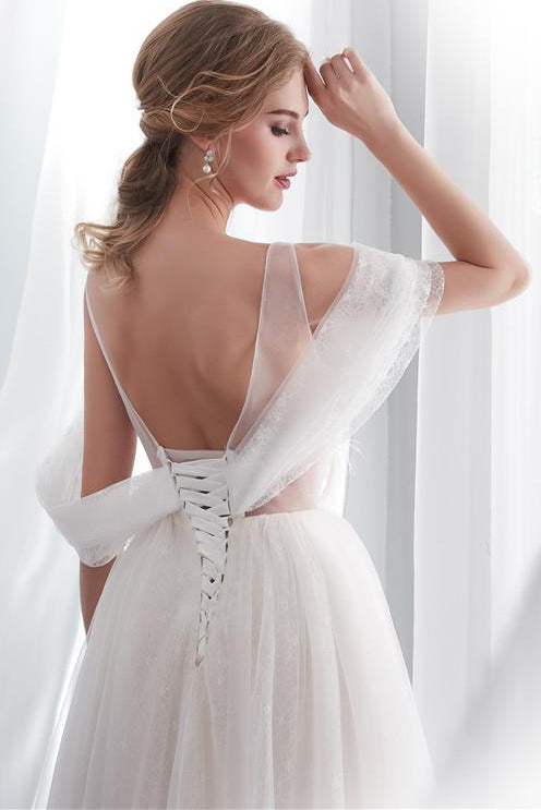Exquisite Princess-Style Long Lace-Up A-line Ivory Wedding Dress Adorned with Appliques