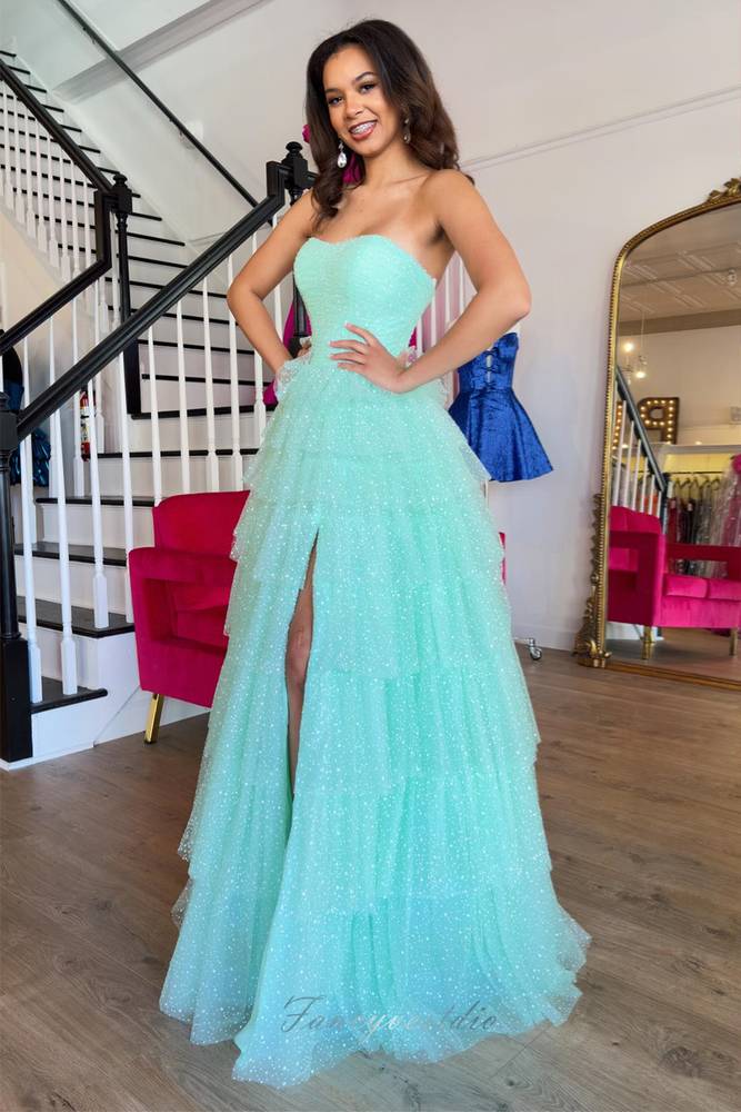 Mint Green Strapless Prom Dress with Ruffle Detailing and Slit for a Stunning Look