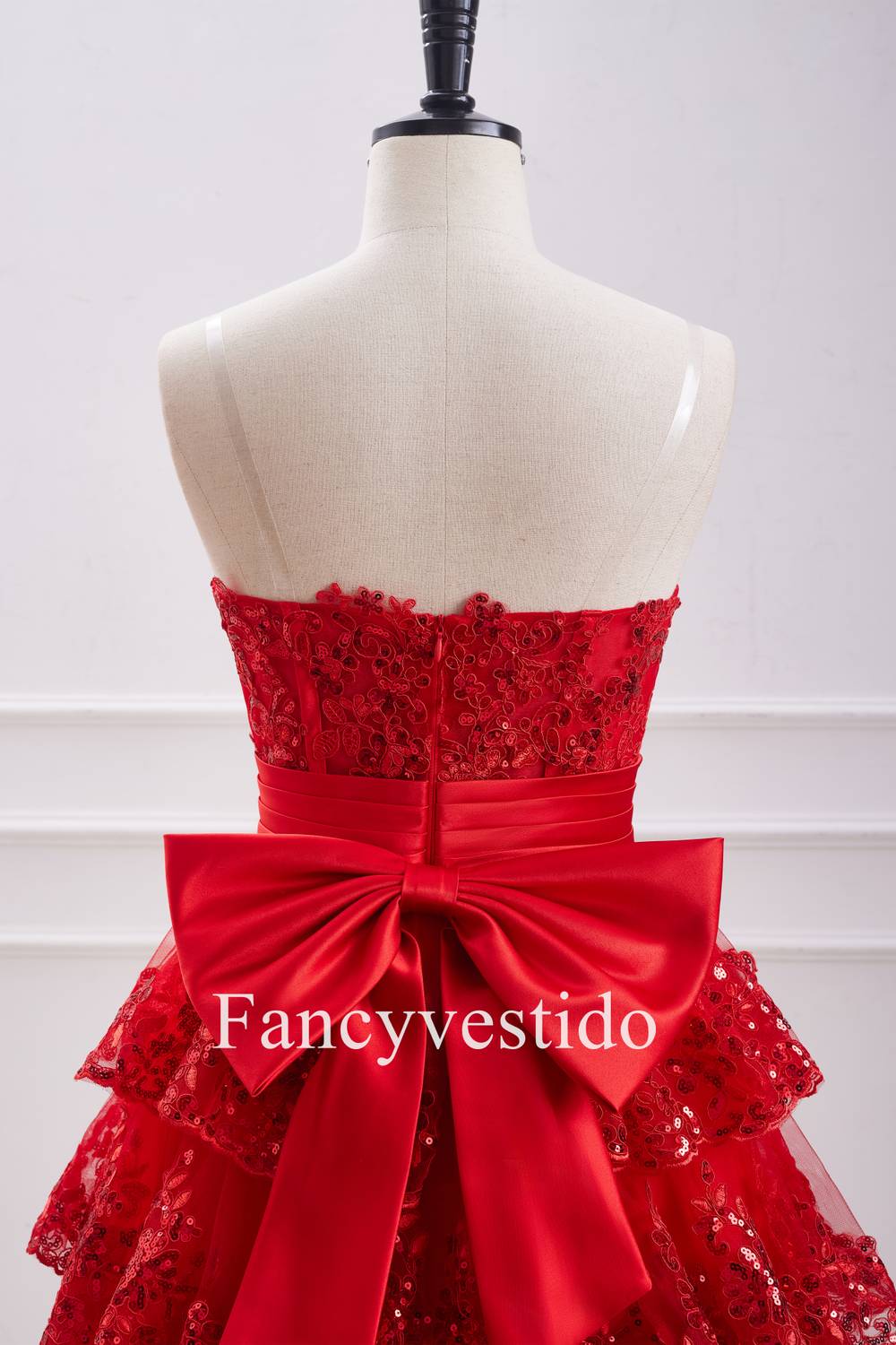 Gorgeous Strapless Red Sequin and Ruffle Corset-style Homecoming Dress with Elegant Bow Embellishment